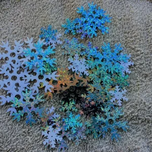 Snöflingor som paljetter